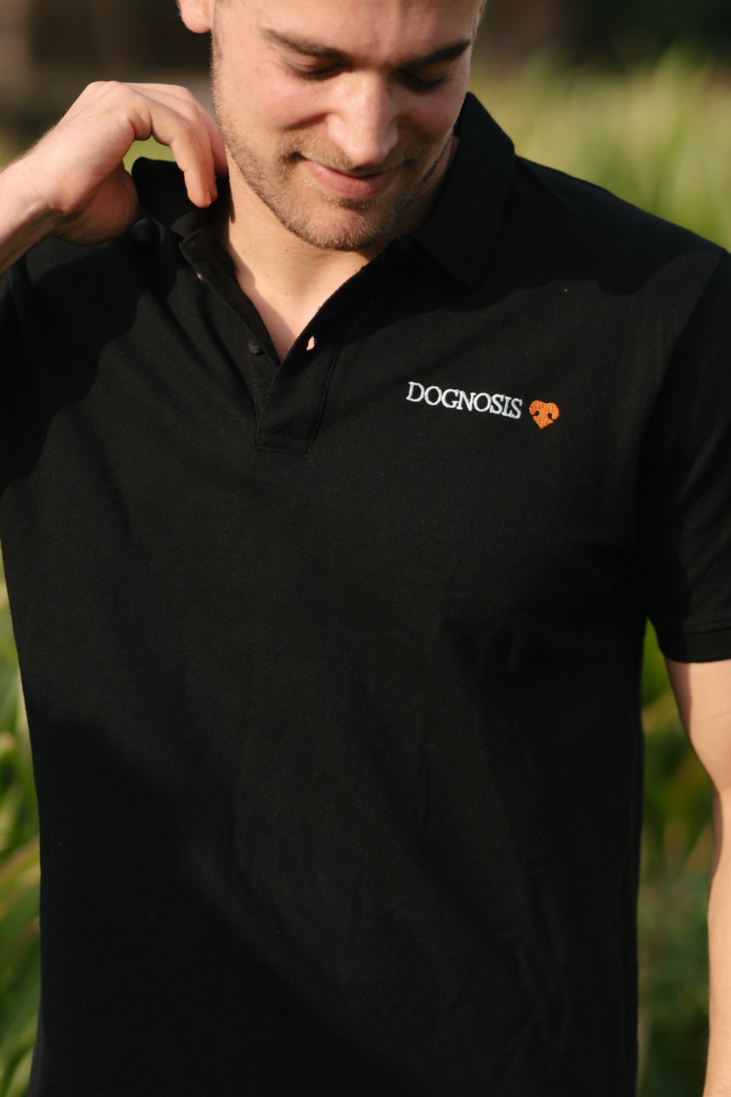 Black Dognosis polo shirt with embroidered chest logo