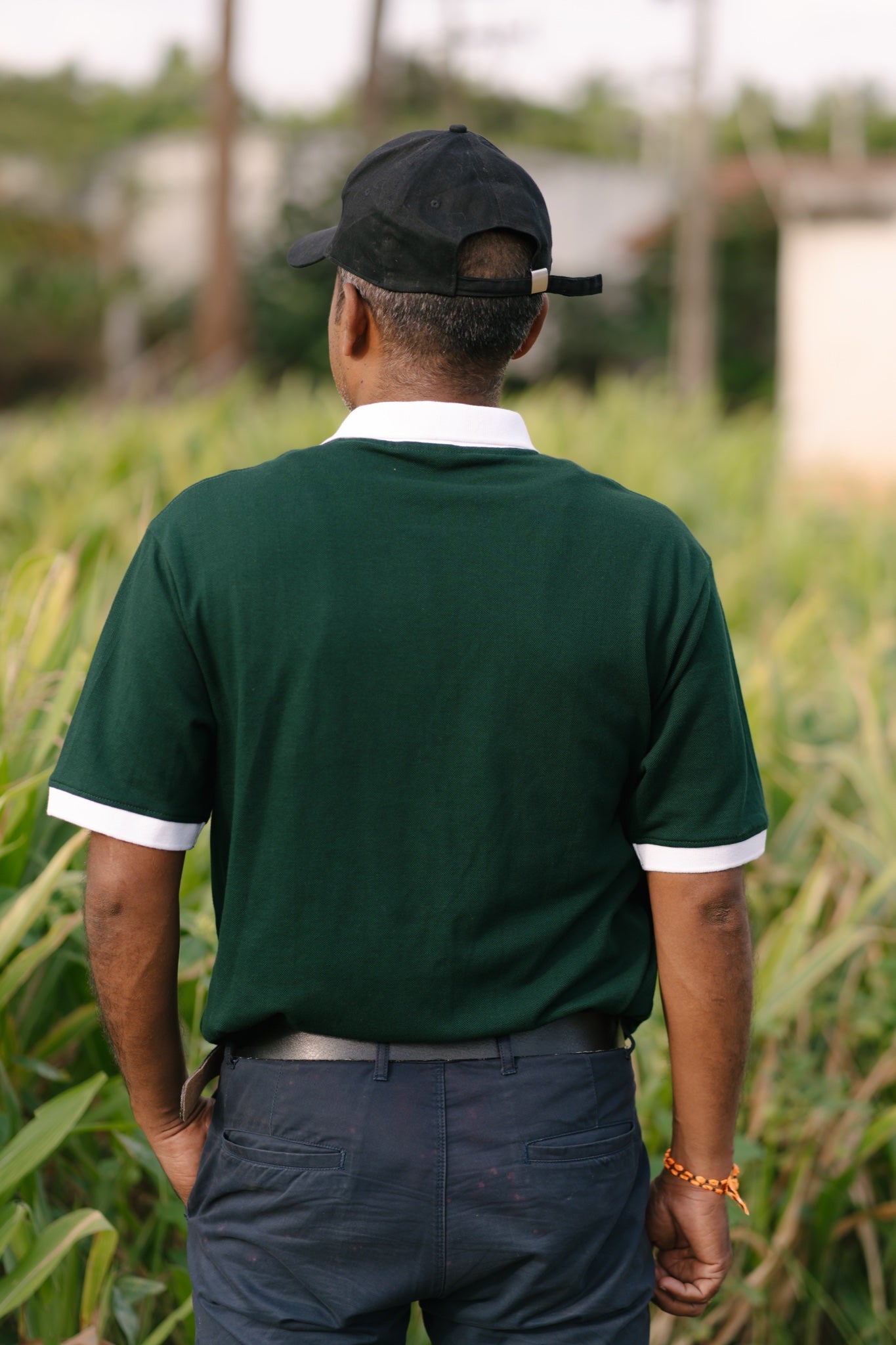 Forest green Dognosis polo shirt with white collar and cuffs