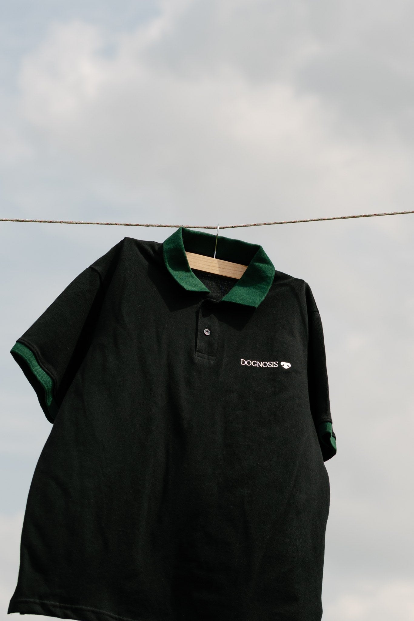 Black Dognosis polo shirt with embroidered chest logo